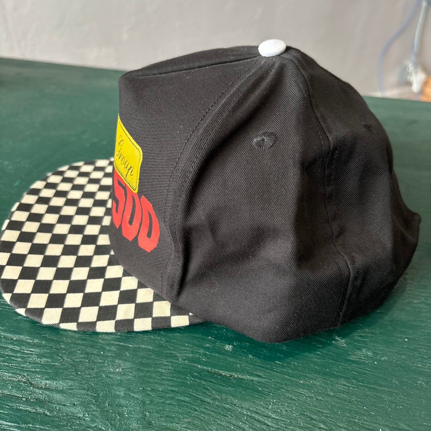 Vintage Utica 500 Hat Snapback with Checkered Bill. Carbon Auto Group.