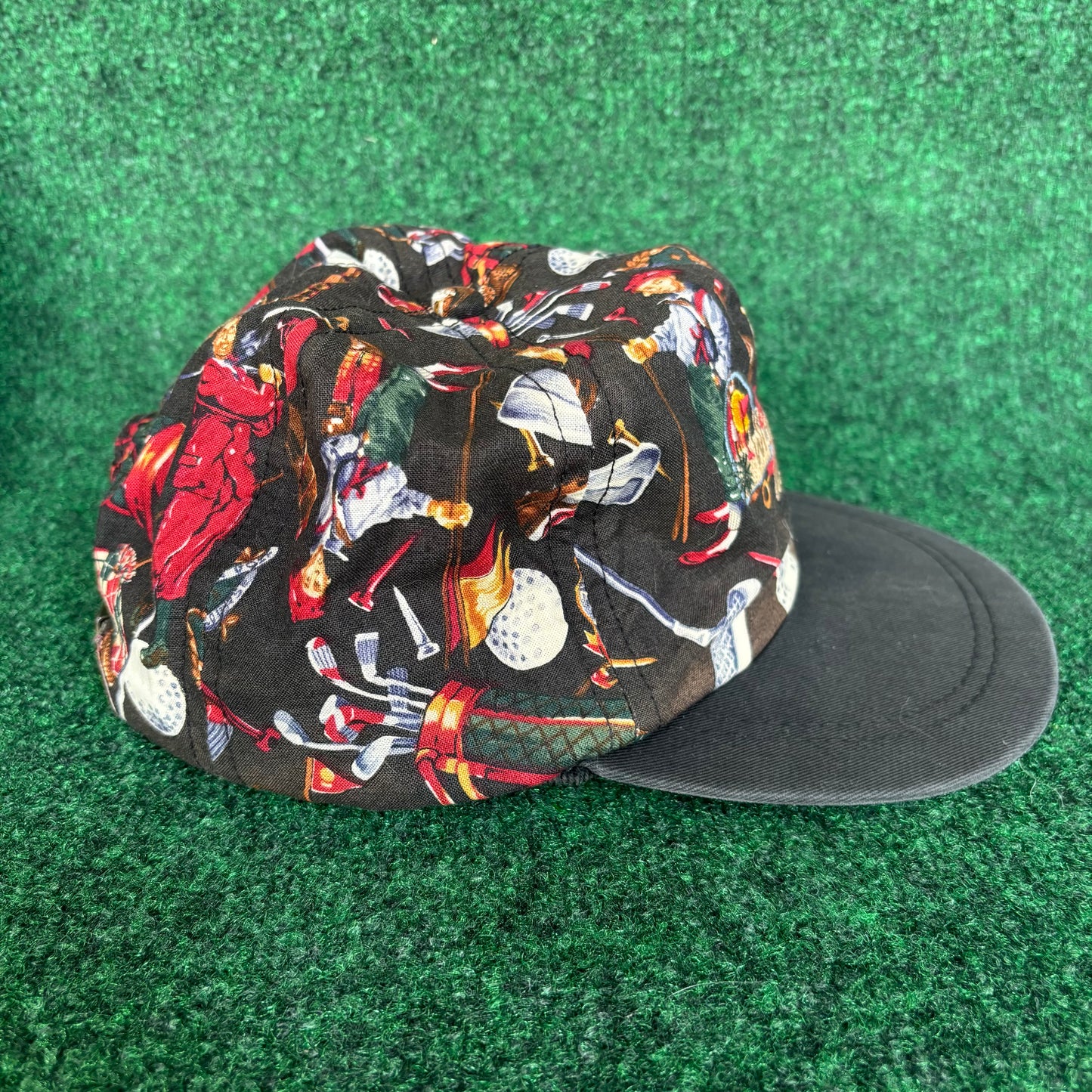 Whispering Winds all over golf print GC Imperial leather strap back